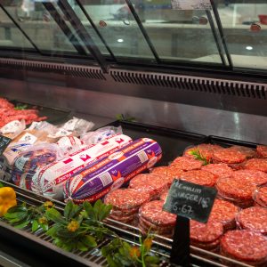 Premium beef burger patties on display at Fleish Meats